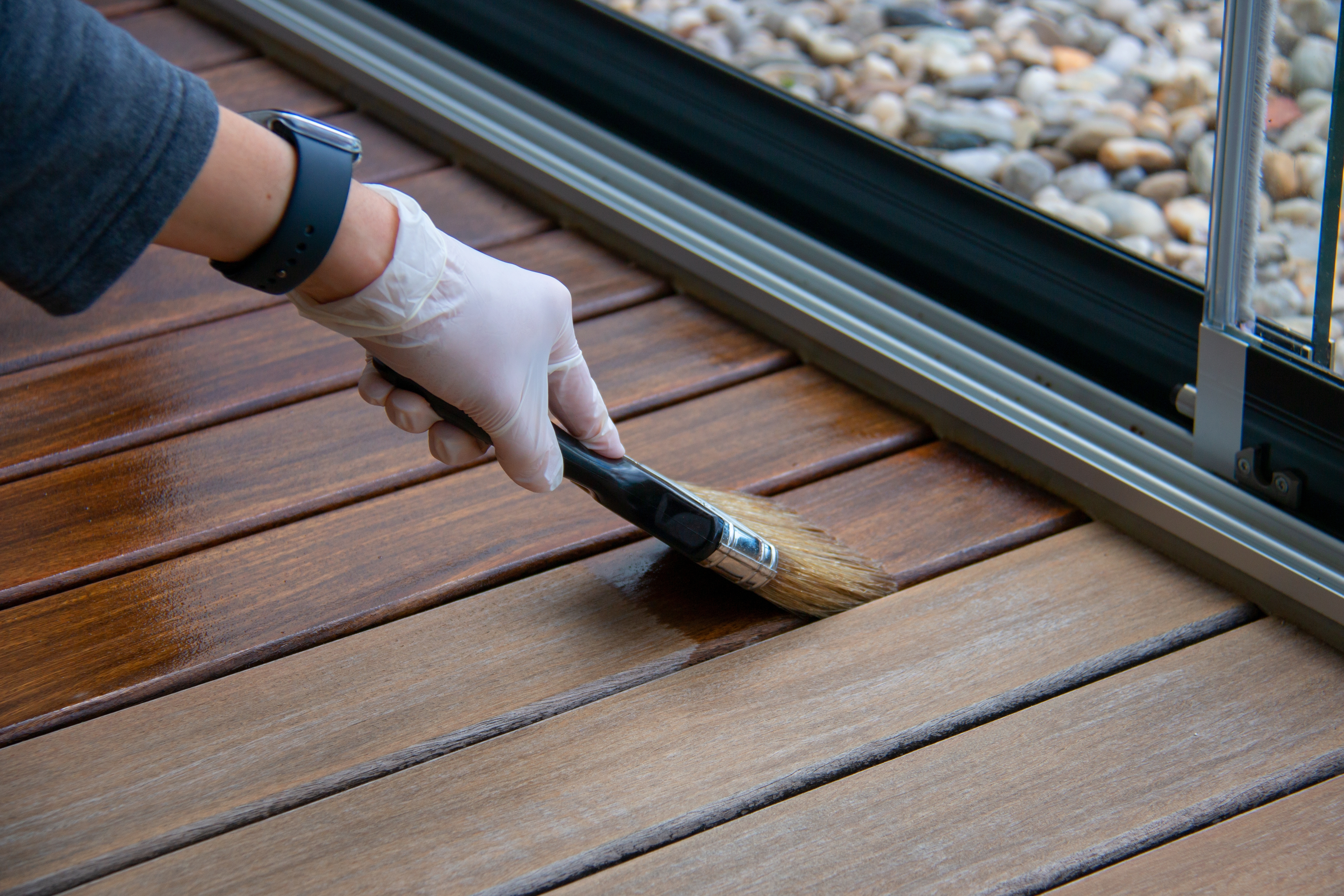 a deck being stained